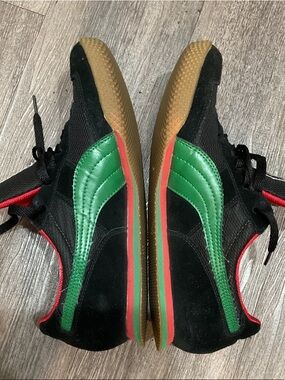 Authentic 💯 Puma Black Sneakers with Green Stripe and Red Accents
